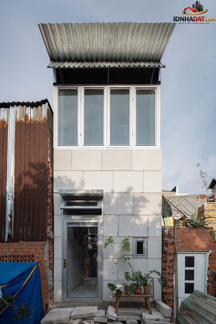 Thiết kế nhà siêu nhỏ 11m2 TP.HCM: Ứng dụng vật liệu nhẹ cho không gian tối giản- Ảnh 1.